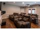 Basement home theater with comfortable seating, a large screen, and ambient lighting at 111 Coltsgate Ct, Summerville, SC 29485