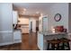 Bright, modern kitchen with white cabinets and bar seating at 111 Coltsgate Ct, Summerville, SC 29485