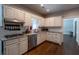 Well-lit kitchen with white cabinets, stainless steel appliances, and stylish countertops at 111 Coltsgate Ct, Summerville, SC 29485