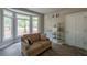 Bright living room with bay window, light-colored carpet, sofa and cat tree at 111 Coltsgate Ct, Summerville, SC 29485
