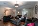Spacious living area with hardwood floors and large clock on the wall at 111 Coltsgate Ct, Summerville, SC 29485