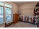 Spacious walk-in closet with ample hanging space, shelving, and a window at 111 Coltsgate Ct, Summerville, SC 29485