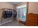 Spacious walk-in closet with ample hanging space, shelving, and a window at 111 Coltsgate Ct, Summerville, SC 29485