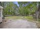 Large backyard with a fire pit, privacy fence, and patio at 111 Macfarren Ln, Summerville, SC 29485