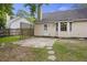 The backyard offers a cozy patio area with a fire pit, perfect for entertaining or relaxation at 111 Macfarren Ln, Summerville, SC 29485
