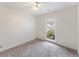 Bedroom with neutral carpet, window, and ceiling fan at 111 Macfarren Ln, Summerville, SC 29485