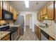 Well-equipped kitchen with stainless steel appliances, granite countertops, and abundant cabinet space at 111 Macfarren Ln, Summerville, SC 29485