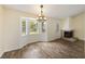 Inviting living room boasting wood floors, a fireplace, and a bay window with views of the outdoors at 111 Macfarren Ln, Summerville, SC 29485