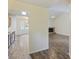 Bright interior view with hardwood floors and a glimpse into the dining area and living room with a fireplace at 111 Macfarren Ln, Summerville, SC 29485