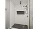 Tiled shower with white subway tile and black fixtures at 111 Macfarren Ln, Summerville, SC 29485