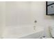 Bathroom featuring a bathtub, a toilet, and a decorative cabinet for towels and toiletries at 1110 Flyway Rd, Summerville, SC 29483