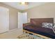 Comfortable bedroom with neutral paint, ceiling fan, and a window at 1110 Flyway Rd, Summerville, SC 29483