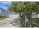 Charming home featuring a well-manicured lawn, two-car garage, and welcoming front porch at 1110 Flyway Rd, Summerville, SC 29483