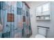 Full bathroom with decorative shower curtain, medicine cabinet and commode at 113 Essex Dr, Summerville, SC 29485
