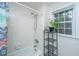 Clean bathroom featuring shower and window with natural light at 113 Essex Dr, Summerville, SC 29485