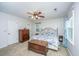 Bright bedroom with a ceiling fan, a bed and access to closet at 113 Essex Dr, Summerville, SC 29485