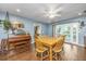 Dining room with hardwood floors and access to the backyard, kitchen, and living area at 113 Essex Dr, Summerville, SC 29485