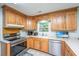 Efficient kitchen with stainless steel appliances and light countertops at 113 Essex Dr, Summerville, SC 29485