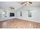 Bright living room with vaulted ceiling, ceiling fans, and wood laminate flooring at 113 Essex Dr, Summerville, SC 29485
