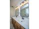 Double vanity bathroom features modern lighting and a spacious countertop, designed for comfort and style at 115 Sully St, Goose Creek, SC 29445