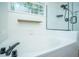 Relaxing bathroom with a soaking tub and a separate glass-enclosed shower at 115 Sully St, Goose Creek, SC 29445