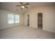 Bright bedroom with a window and neutral walls, offering a serene and inviting space at 115 Sully St, Goose Creek, SC 29445