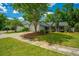 Exterior of the property with a driveway leading to an attached garage and landscaped front yard at 115 Sully St, Goose Creek, SC 29445