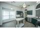 Eat-in kitchen area with bright natural light and an island providing additional prep space at 115 Sully St, Goose Creek, SC 29445