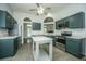 Open kitchen design with stainless steel appliances and an island enhances flow and function at 115 Sully St, Goose Creek, SC 29445