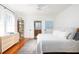 Serene bedroom with bright windows, a comfortable bed, and stylish furnishings, creating a peaceful retreat at 1153 King St, Charleston, SC 29403