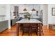 Spacious kitchen features a large center island with seating and modern stainless steel appliances at 1153 King St, Charleston, SC 29403