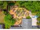 An aerial view of a backyard showcasing a large garden area and outdoor seating space at 1158 Shoreside Way, Mount Pleasant, SC 29464