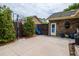 Backyard patio with basketball hoop, door access, and mature landscaping at 1158 Shoreside Way, Mount Pleasant, SC 29464