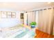 Light-filled bedroom features hardwood floors and stylish decor at 1158 Shoreside Way, Mount Pleasant, SC 29464