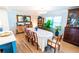 Formal dining room features hardwood floors, ample light and traditional furnishings at 1158 Shoreside Way, Mount Pleasant, SC 29464