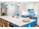 Bright and modern kitchen featuring a large center island, stainless appliances and pendant lighting at 1158 Shoreside Way, Mount Pleasant, SC 29464