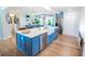 Spacious kitchen featuring a large island, stainless steel appliances and light wood flooring at 1158 Shoreside Way, Mount Pleasant, SC 29464