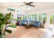 Sunroom with skylights, tile floors and comfortable seating at 1158 Shoreside Way, Mount Pleasant, SC 29464
