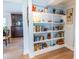 Living room built-in bookshelf with decorative accents at 1158 Shoreside Way, Mount Pleasant, SC 29464