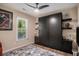 Contemporary bedroom with a Murphy bed, shelves, and decor at 1250 Wide Water Ct, Charleston, SC 29412