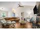 Spacious living room featuring wood floors, fireplace, comfortable seating, and natural light at 1250 Wide Water Ct, Charleston, SC 29412