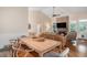 Open-concept living area combines dining and sitting areas with a fireplace and lots of light at 1250 Wide Water Ct, Charleston, SC 29412