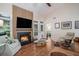 Cozy living room with a modern fireplace, vaulted ceilings, and comfortable seating at 1250 Wide Water Ct, Charleston, SC 29412