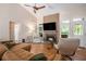 Inviting living room with a fireplace and high ceilings at 1250 Wide Water Ct, Charleston, SC 29412