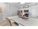 Well-lit kitchen showcases a breakfast bar with pendant lighting and modern appliances at 130 River Landing Dr # 3202, Charleston, SC 29492