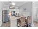 Modern kitchen features white cabinetry, stainless steel appliances, and breakfast bar at 130 River Landing Dr # 3202, Charleston, SC 29492