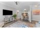 Open-concept living space showcases a modern kitchen and comfortable living area at 130 River Landing Dr # 3202, Charleston, SC 29492