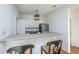 Inviting kitchen featuring granite breakfast bar, stainless steel appliances, and ample cabinet space at 130 River Landing Dr # 7106, Charleston, SC 29492