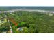 Expansive aerial view of a wooded property, highlighting the home's serene, private setting at 1375 Tannanger Trl, Awendaw, SC 29429