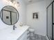 Modern bathroom with a glass-enclosed shower, black framed mirror, and stylish tile floor at 1375 Tannanger Trl, Awendaw, SC 29429